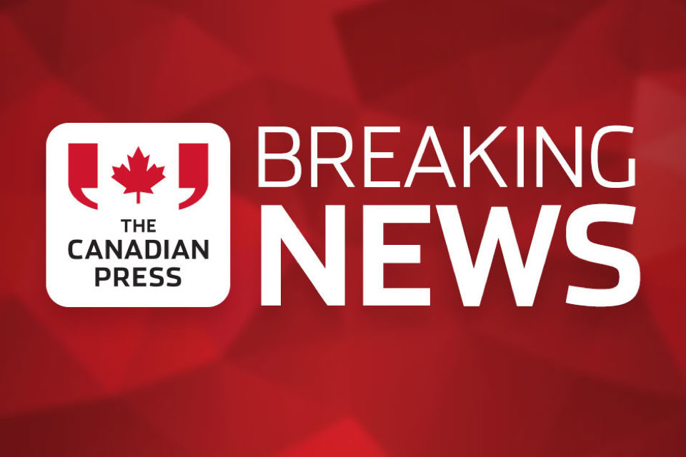 Red background with "The Canadian Press" logo and the words "Breaking News" in white text.